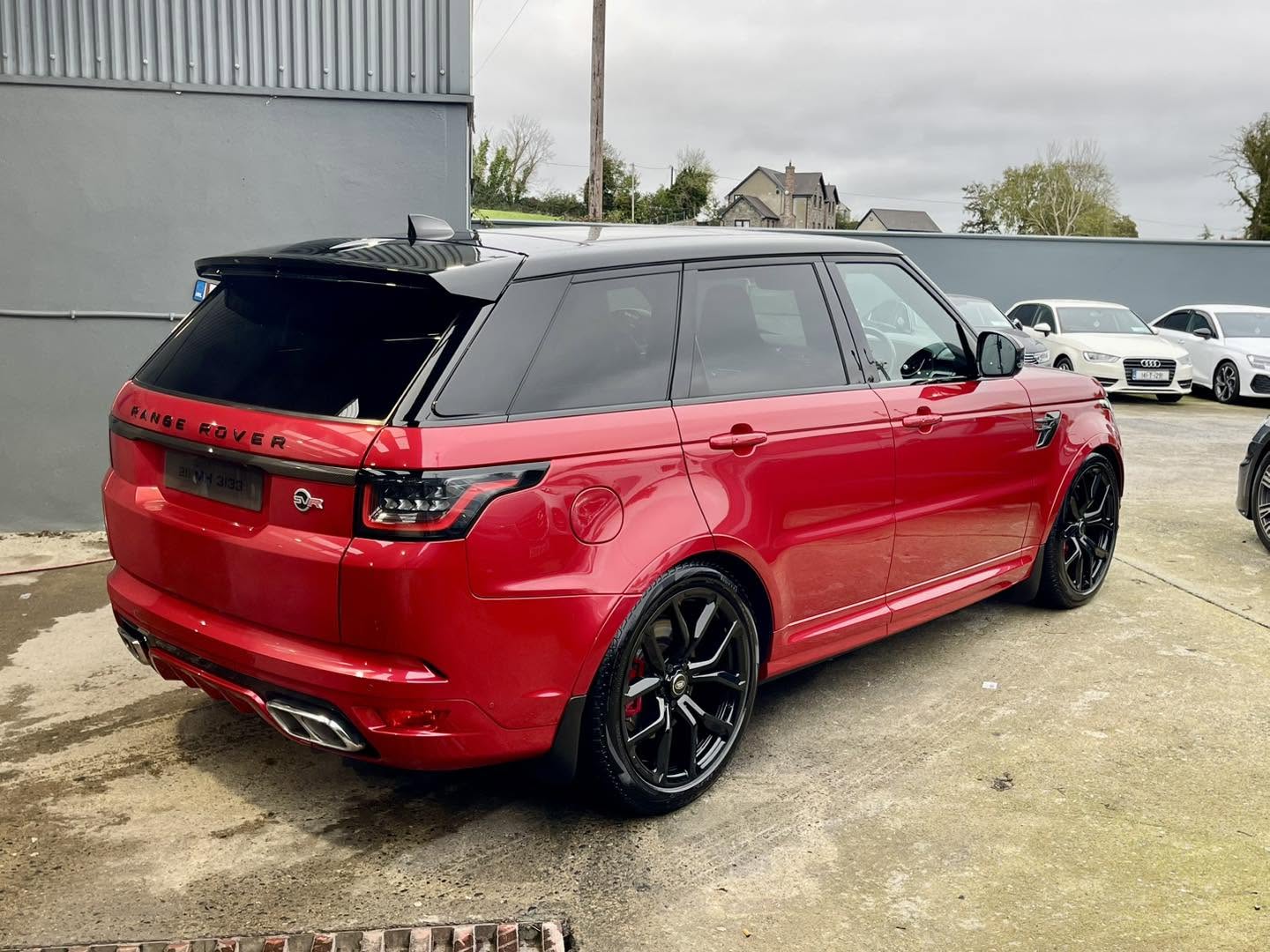 Red Range Rover with a clean maintained finish